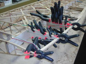 A million clamps holds the curved piece in place while the epoxy sets up.